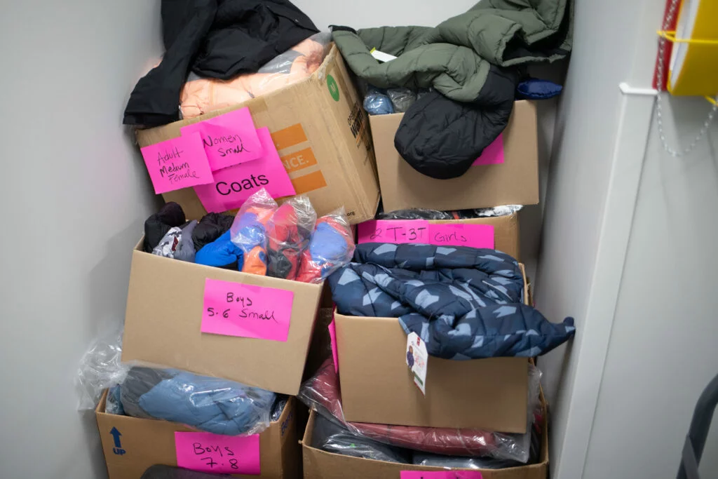 Boxes of clothes awaiting sorting