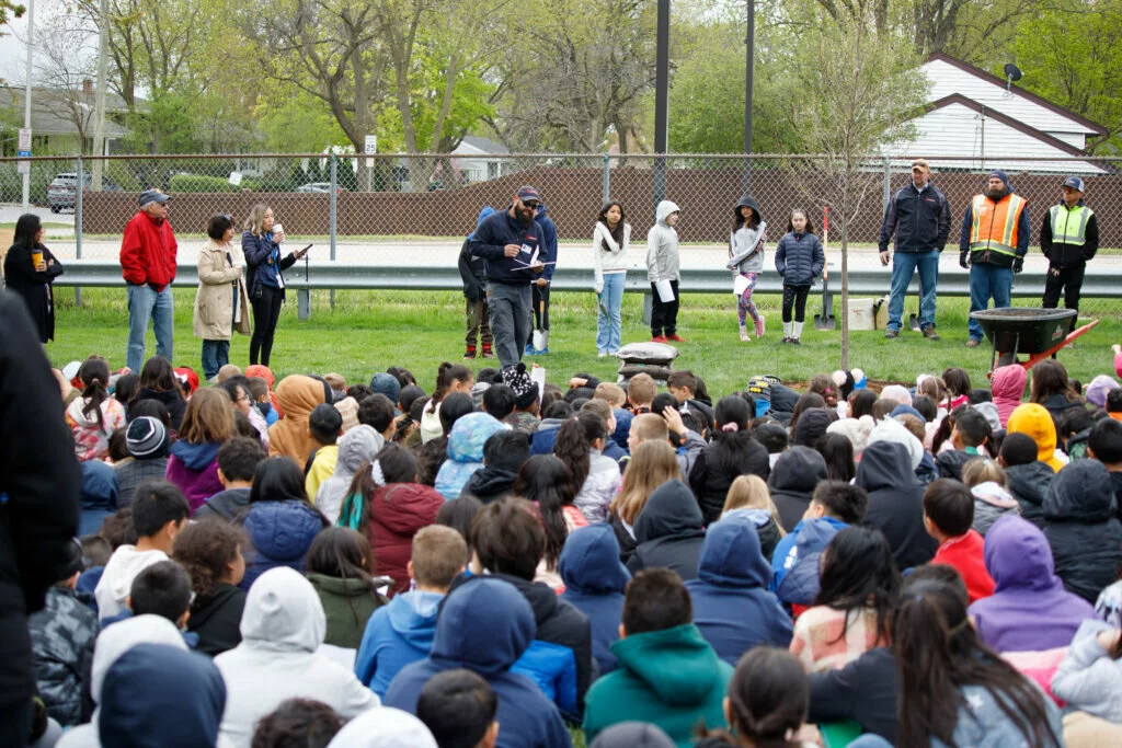 The entire Field student body gathers to celebrate the planting of a hybrid elm