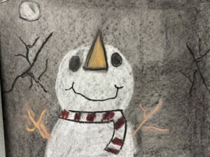 A drawing of a snowman by a student. 