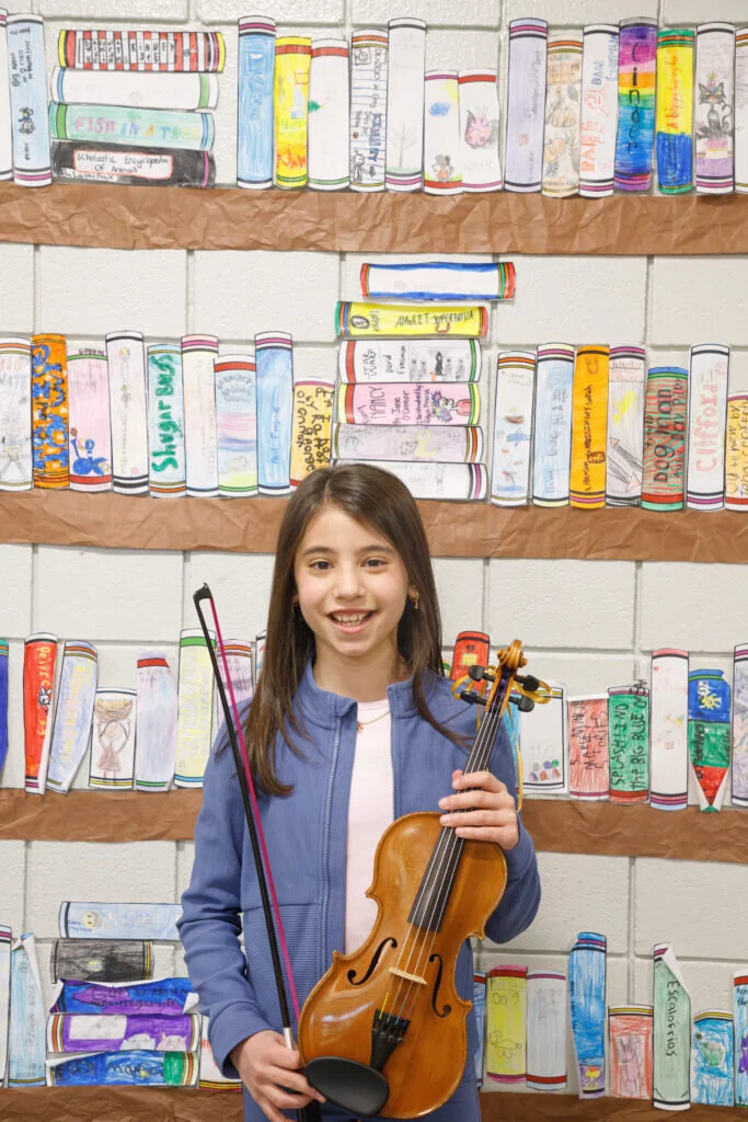 Julia C., a fourth grader at Field Elementary School, will perform with the Milwaukee Symphony Orchestra on April 30 after having won the 2025 Bach Double Violin Competition