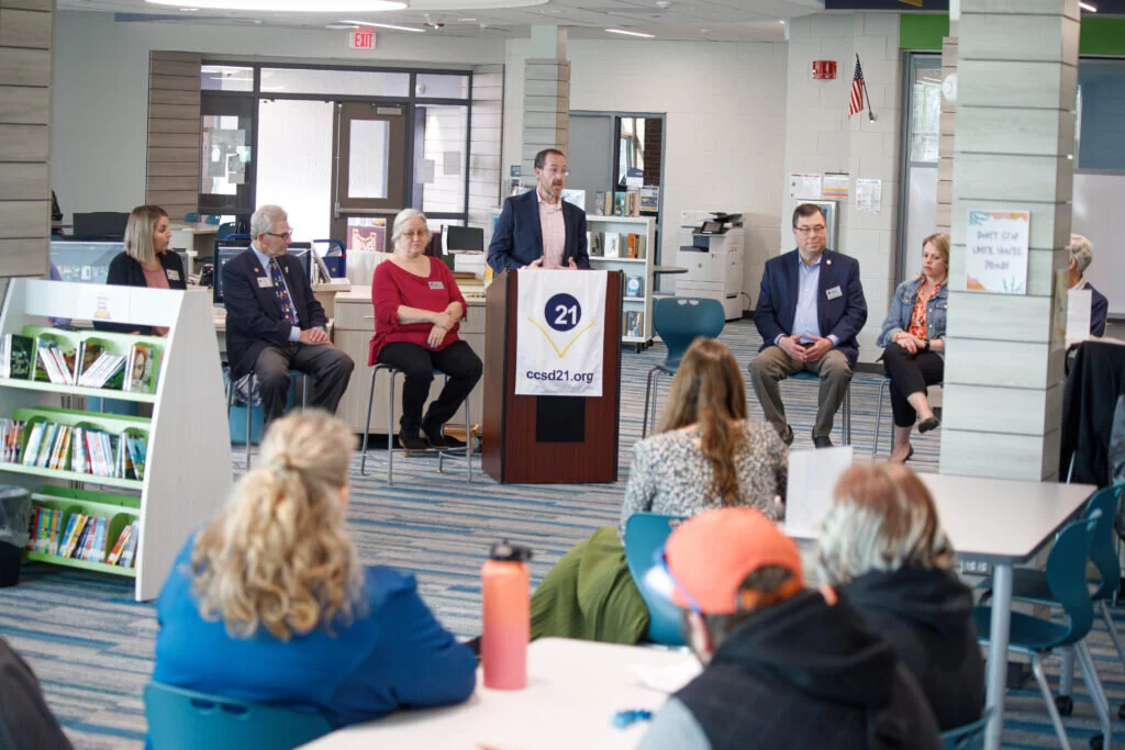 Dr. Michael Connolly, superintendent, speaks before the crowd at the ribbon-cutting for Holmes' renovated library and media center