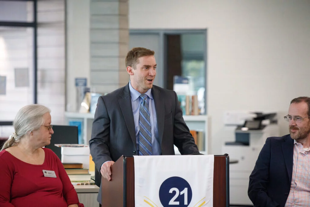 Stephen Mogni, assistant principal for climate and culture, speaks during the ribbon-cutting ceremony