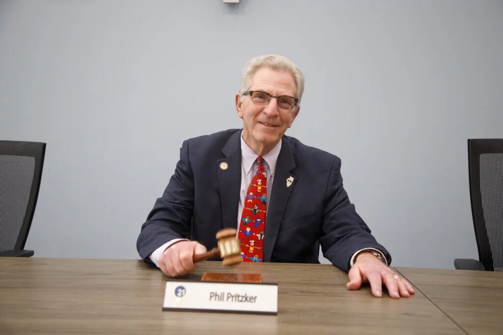 Phil Pritzker signaled the end of his three-and-a-half-decade journey on the D21 Board of Education at its April 24 meeting